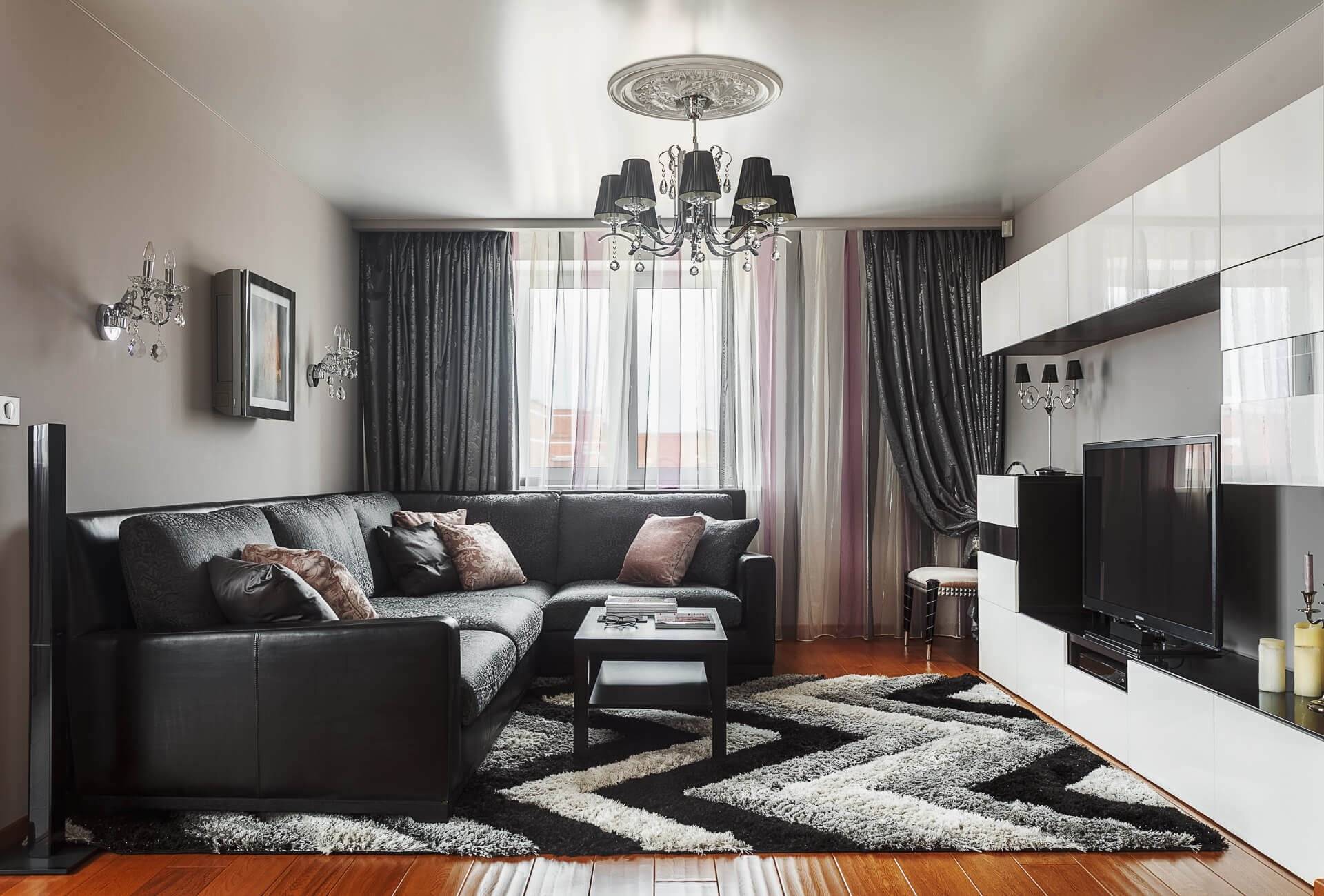 Черный диван в интерьере – ставка на элегантность | домфронт